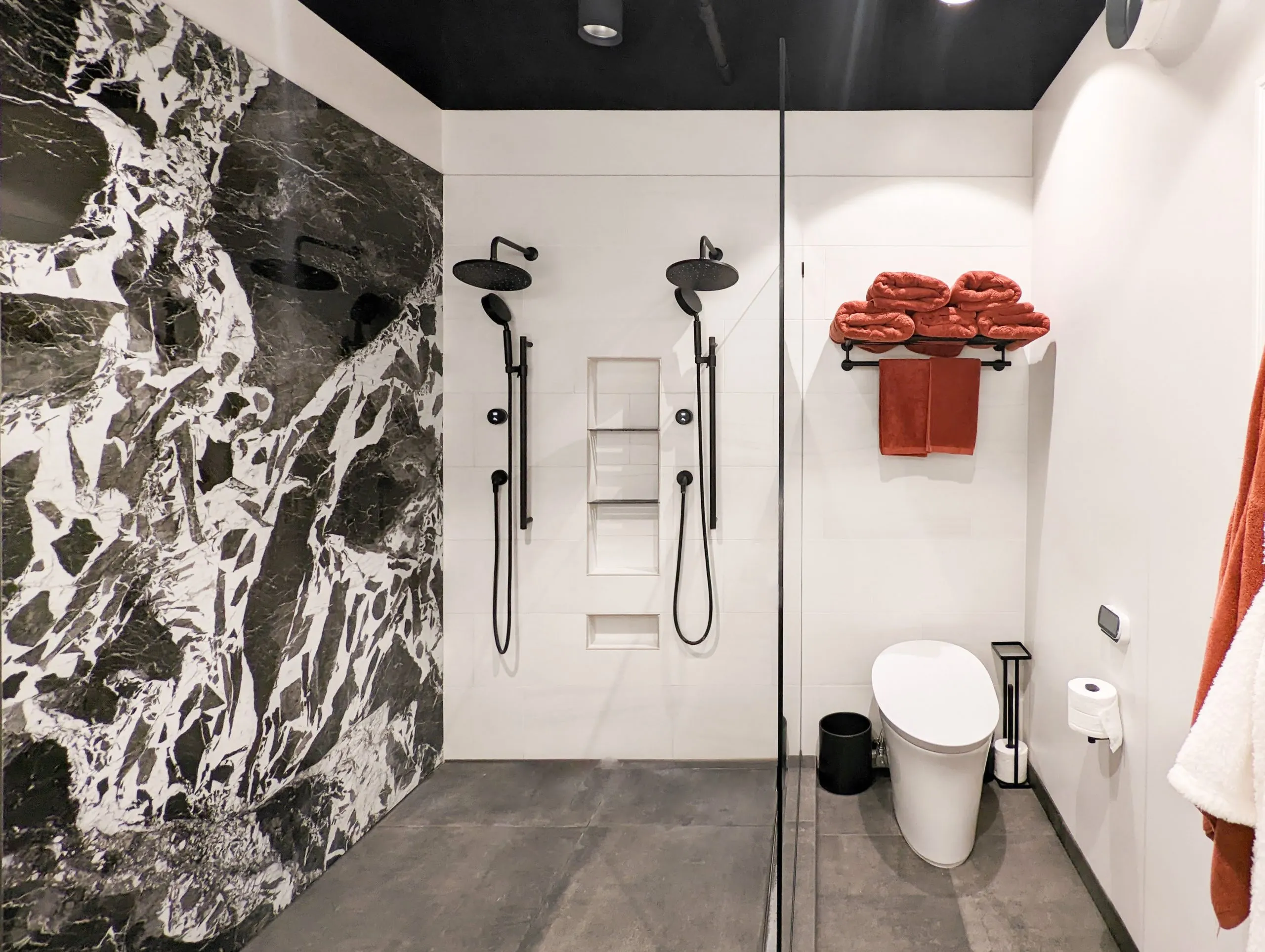 Bright bathroom with tiled shower
